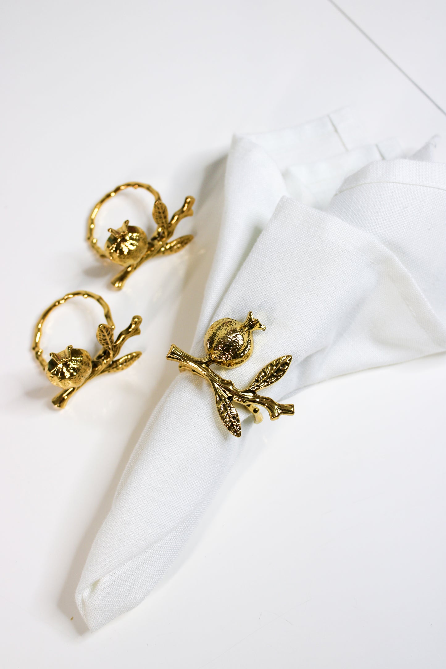 Golden Rimon Napkin Rings